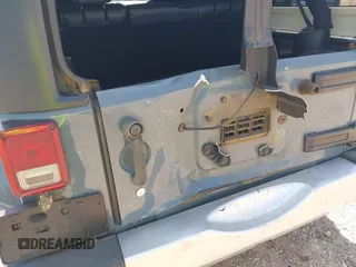 2014 Jeep Wrangler Unlimited Sahara with VIN 1C4BJWEG5EL326980, listed as a IAAI auction lot 42031659 with 116,181 mi miles and . Bid and sale history available at DreamBid. Image 17.