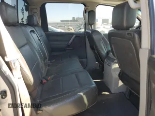 2004 Nissan Titan LE z VIN 1N6AA07B64N525238, wystawiony jako Copart lot #60370775 z przebiegiem Nie podano mil oraz Czysty tytuł • Clean title. Historia ofert i sprzedaży dostępna na DreamBid. Obrazek 10.