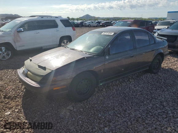 1999 Saturn SL with VIN 1G8ZK527XXZ136922, listed as a Copart auction lot 86704404 with 134,897 mi miles and Salvage Title. Bid and sale history available at carsss.com. Image 1.