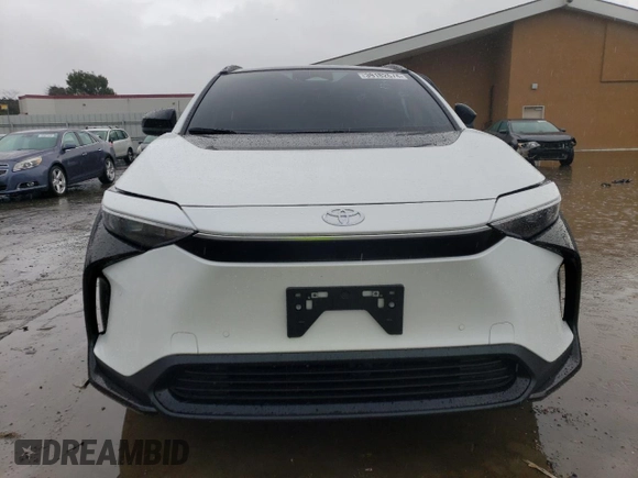 2023 Toyota bZ4X XLE with VIN JTMAAAAA2PA027753, listed as a Copart auction lot 39182674 with 921 mi miles and . Bid and sale history available at DreamBid. Image 5.