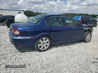 2004 Jaguar X-Type with VIN SAJEA51C44WD83361, listed as a Copart auction lot 55643545 with 54,615 mi miles and Salvage Title. Bid and sale history available at DreamBid. Image 3.