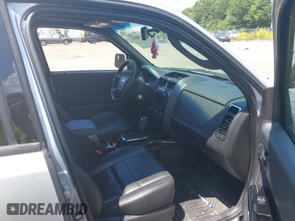 2010 Ford Escape Limited z VIN 1FMCU9EG7AKC87480, wystawiony jako IAAI lot #42748832 z przebiegiem 86 566 mil mil oraz . Historia ofert i sprzedaży dostępna na DreamBid. Obrazek 5.