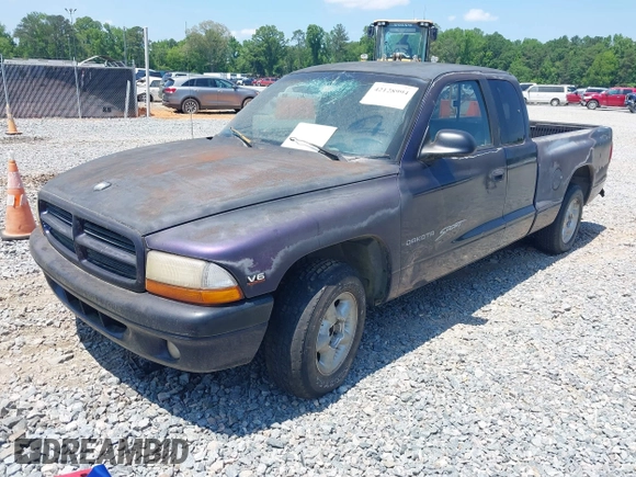 1998 Dodge Dakota SLT with VIN 1B7GL22X3WS569885, listed as a IAAI auction lot 42128994 with 1 mi miles. Bid and sale history available at carsss.com. Image 2.