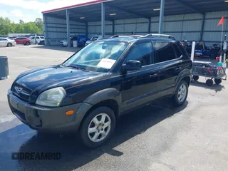 2005 Hyundai Tucson GLS with VIN KM8JN72D65U102543, listed as a IAAI auction lot 41978994 with 147,688 mi miles. Bid and sale history available at carsss.com. Image 2.