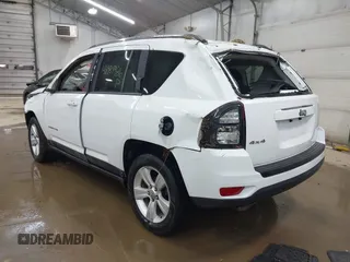 2014 Jeep Compass Sport with VIN 1C4NJDBB3ED773960, listed as a IAAI auction lot 41989986 with 126,875 mi miles. Bid and sale history available at carsss.com. Image 3.