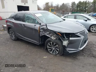 2021 Lexus RX with VIN 2T2HZMDA4MC259360, listed as a IAAI auction lot 41820519 with 57,747 mi miles. Bid and sale history available at carsss.com. Image 1.