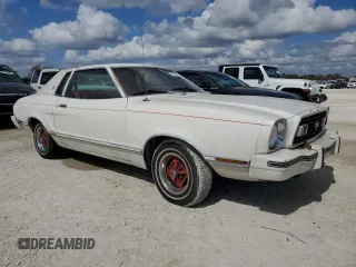 1977 Ford Mustang z VIN 7F04Z150204, wystawiony jako Copart lot #77276344 z przebiegiem 94 802 mil mil oraz Szkoda całkowita • Salvage title. Historia ofert i sprzedaży dostępna na DreamBid. Obrazek 4.