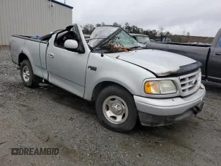 2003 Ford F-150 XL with VIN 1FTRF172X3NB77391, listed as a Copart auction lot 80657174 with Not Provided miles and Salvage Title. Bid and sale history available at DreamBid. Image 4.