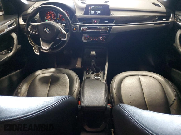 2017 BMW X1 xDrive28i with VIN WBXHT3Z39H4A51967, listed as a Copart auction lot 58843125 with 108,415 mi miles and Clean title. Bid and sale history available at DreamBid. Image 8.