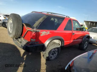 2004 Chevrolet Blazer LS z VIN 1GNCT18X34K141674, wystawiony jako Copart lot #85500954 z przebiegiem Nie podano mil oraz Czysty tytuł • Clean title. Historia ofert i sprzedaży dostępna na DreamBid. Obrazek 3.