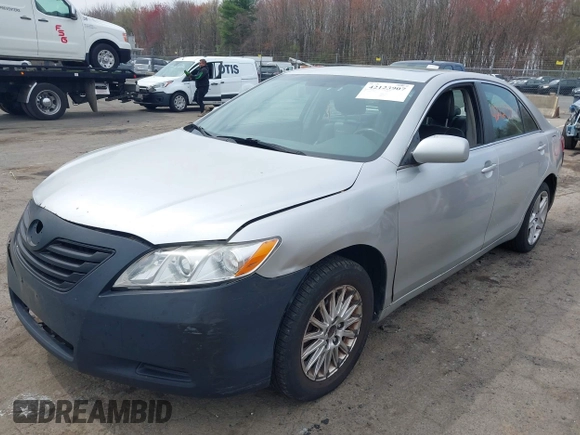 2007 Toyota Camry CE with VIN 4T1BE46K47U528827, listed as a IAAI auction lot 42123907 with 257,248 mi miles. Bid and sale history available at carsss.com. Image 2.