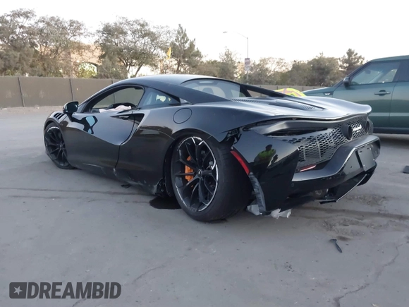2023 McLaren Artura z VIN SBM16AEA4PW001449, wystawiony jako IAAI lot #41347791 z przebiegiem 4703 mil mil oraz . Historia ofert i sprzedaży dostępna na DreamBid. Obrazek 3.