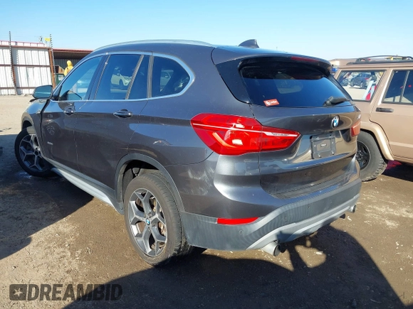 2017 BMW X1 sDrive28i with VIN WBXHU7C30H5H32753, listed as a IAAI auction lot 41441791 with 100,072 mi miles. Bid and sale history available at carsss.com. Image 3.