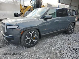 2023 Rivian R1S Launch Edition with VIN 7PDSGABL9PN022280, listed as a Copart auction lot 83526124 with 51 mi miles and Salvage Title. Bid and sale history available at carsss.com. Image 1.