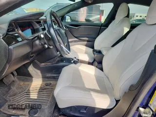 2018 Tesla Model S 75D с VIN 5YJSA1E26JF275221, выставлен на аукционе Copart как лот 61101885 с пробегом 122 530 миль миль и Списание • Salvage title. История ставок и продаж доступна на DreamBid. Изображение 7.