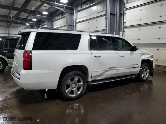2017 Chevrolet Suburban Premier with VIN 1GNSKJKC1HR131632, listed as a Copart auction lot 49453455 with 140,325 mi miles and Salvage Title. Bid and sale history available at carsss.com. Image 3.