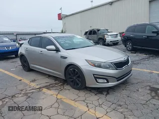 2015 Kia Optima SX with VIN 5XXGR4A73FG372494, listed as a IAAI auction lot 42345043 with 196,911 mi miles and . Bid and sale history available at DreamBid. Image 1.