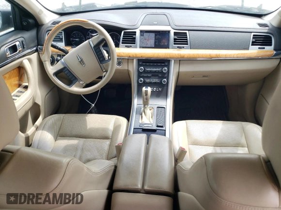 2011 Lincoln MKS EcoBoost with VIN 1LNHL9FT0BG601897, listed as a Copart auction lot 52746045 with 139,924 mi miles and Salvage Title. Bid and sale history available at DreamBid. Image 8.