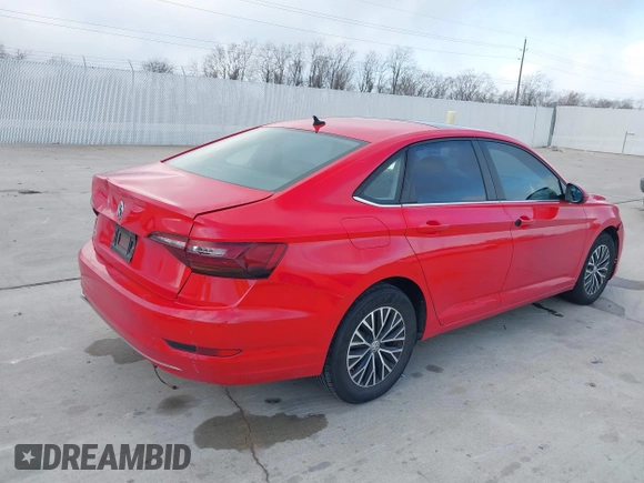 2019 Volkswagen Jetta S z VIN 3VWC57BUXKM099060, wystawiony jako IAAI lot #41478697 z przebiegiem 134 363 mil mil oraz . Historia ofert i sprzedaży dostępna na DreamBid. Obrazek 4.