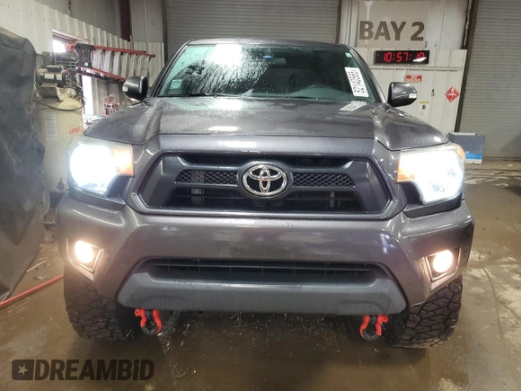 2014 Toyota Tacoma with VIN 5TFLU4ENXEX089927, listed as a Copart auction lot 52140565 with 112,924 mi miles and Salvage Title. Bid and sale history available at DreamBid. Image 5.