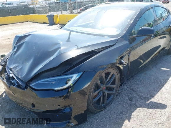 2022 Tesla Model S Plaid with VIN 5YJSA1E61NF483354, listed as a IAAI auction lot 41973636 with 32,541 mi miles and . Bid and sale history available at DreamBid. Image 19.