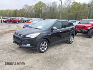2015 Ford Escape SE with VIN 1FMCU0GX3FUC73452, listed as a IAAI auction lot 41923211 with 140,952 mi miles. Bid and sale history available at carsss.com. Image 2.