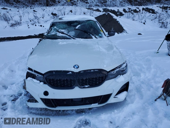 2022 BMW 3 Series M340i xDrive with VIN 3MW5U9J04N8C57069, listed as a Copart auction lot 88677765 with 0 mi miles and Salvage Title. Bid and sale history available at carsss.com. Image 5.