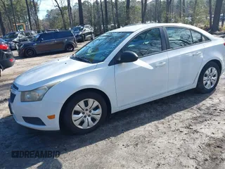 2014 Chevrolet Cruze LS with VIN 1G1PA5SH1E7167616, listed as a IAAI auction lot 41589435 with 180,149 mi miles and . Bid and sale history available at DreamBid. Image 2.