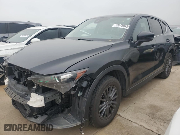 2021 Mazda CX-5 Touring z VIN JM3KFBCM8M0321766, wystawiony jako Copart lot #52845085 z przebiegiem 115 627 mil mil oraz Szkody całkowita. Historia ofert i sprzedaży dostępna na DreamBid. Obrazek 1.