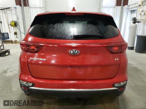 2020 Kia Sportage EX with VIN KNDPNCAC2L7703007, listed as a Copart auction lot 54276035 with 65,269 mi miles and Salvage title. Bid and sale history available at DreamBid. Image 6.