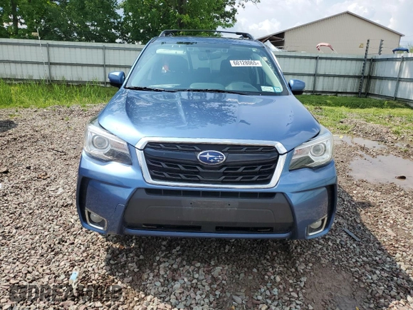 2017 Subaru Forester Touring with VIN JF2SJGWC9HH574837, listed as a Copart auction lot 60128065 with Not provided miles and Salvage title. Bid and sale history available at DreamBid. Image 5.