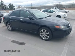 2004 Acura TSX w/Navigation with VIN JH4CL96974C043235, listed as a IAAI auction lot 41793630 with 147,069 mi miles. Bid and sale history available at carsss.com. Image 1.
