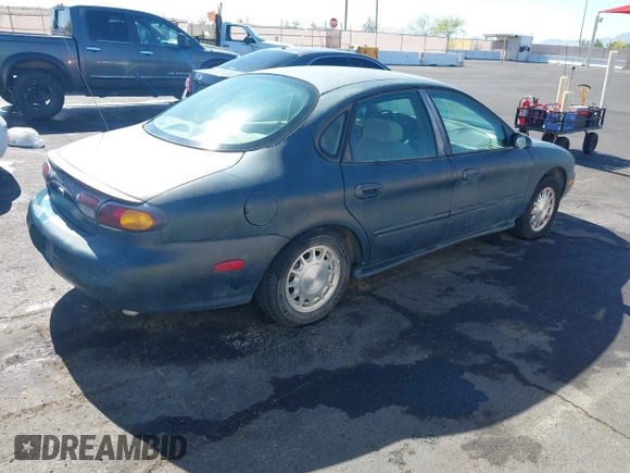 1996 Ford Taurus LX with VIN 1FALP53S0TG125665, listed as a IAAI auction lot 42290691 with 91,152 mi miles and . Bid and sale history available at DreamBid. Image 4.