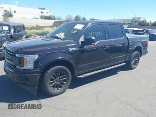 2019 Ford F-150 XL with VIN 1FTEW1CP9KKD28429, listed as a IAAI auction lot 41397905 with 96,793 mi miles and . Bid and sale history available at carsss.com. Image 2.