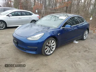 2019 Tesla Model 3 Long Range with VIN 5YJ3E1EB9KF454007, listed as a IAAI auction lot 41769346 with 141,609 mi miles. Bid and sale history available at carsss.com. Image 19.