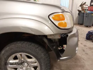 2004 Toyota Tundra SR5 with VIN 5TBDT44104S441271, listed as a IAAI auction lot 41823831 with 296,637 mi miles and . Bid and sale history available at DreamBid. Image 19.