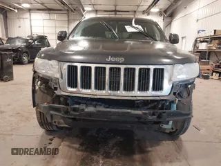2011 Jeep Grand Cherokee 70th Anniversary with VIN 1J4RR4GG3BC745652, listed as a IAAI auction lot 41133698 with 217,948 mi miles. Bid and sale history available at carsss.com. Image 6.