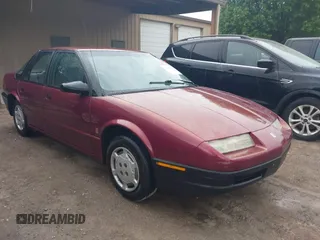 1994 Saturn SL z VIN 1G8ZH5594RZ230566, wystawiony jako IAAI lot #42090623 z przebiegiem 149 191 mil mil oraz . Historia ofert i sprzedaży dostępna na DreamBid. Obrazek 1.