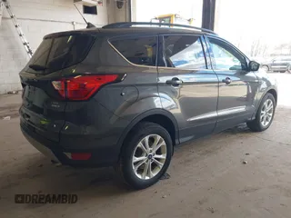2019 Ford Escape SEL with VIN 1FMCU9HD1KUC04360, listed as a IAAI auction lot 42050815 with 114,741 mi miles. Bid and sale history available at carsss.com. Image 4.