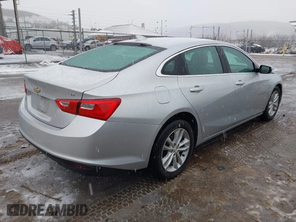 2018 Chevrolet Malibu LT z VIN 1G1ZD5STXJF269890, wystawiony jako IAAI lot #41504935 z przebiegiem 107 190 mil mil oraz . Historia ofert i sprzedaży dostępna na DreamBid. Obrazek 4.
