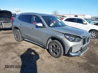 2023 BMW X1 xDrive28i with VIN WBX73EF03P5Y16663, listed as a IAAI auction lot 41284371 with 12,440 mi miles. Bid and sale history available at carsss.com. Image 1.
