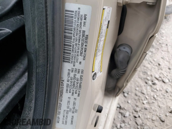 2014 FIAT 500L Lounge with VIN ZFBCFACH0EZ029698, listed as a Copart auction lot 44010995 with 113,555 mi miles and Salvage Title. Bid and sale history available at DreamBid. Image 12.