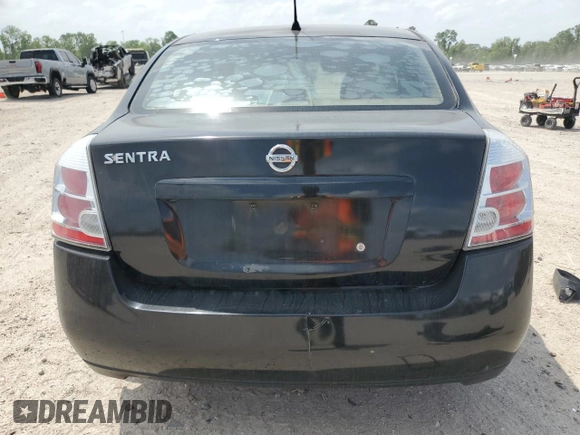 2009 Nissan Sentra S FE+ z VIN 3N1AB61E79L691865, wystawiony jako Copart lot #53956455 z przebiegiem 179 480 mil mil oraz Szkoda całkowita • Salvage title. Historia ofert i sprzedaży dostępna na DreamBid. Obrazek 6.