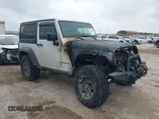 2013 Jeep Wrangler Rubicon 10th Anniversary with VIN 1C4BJWCG7DL545991, listed as a IAAI auction lot 42162963 with 125,621 mi miles and . Bid and sale history available at DreamBid. Image 1.