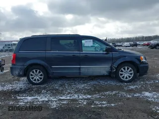 2013 Chrysler Town & Country Touring with VIN 2C4RC1BGXDR613852, listed as a IAAI auction lot 40973841 with 150,234 mi miles. Bid and sale history available at carsss.com. Image 13.