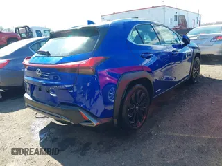 2021 Lexus UX with VIN JTHR9JBH1M2050209, listed as a IAAI auction lot 41874736 with 31,536 mi miles. Bid and sale history available at carsss.com. Image 4.