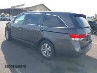 2016 Honda Odyssey EX-L with VIN 5FNRL5H62GB070194, listed as a IAAI auction lot 41664352 with 112,112 mi miles. Bid and sale history available at carsss.com. Image 3.