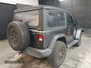 2021 Jeep Wrangler Sport S with VIN 1C4HJXAG2MW502452, listed as a IAAI auction lot 42031159 with 87,952 mi miles and . Bid and sale history available at DreamBid. Image 4.