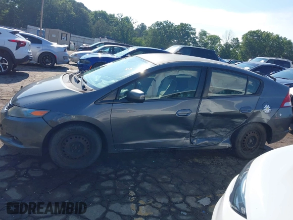 2010 Honda Insight LX with VIN JHMZE2H52AS032697, listed as a IAAI auction lot 42255794 with 262,251 mi miles and . Bid and sale history available at DreamBid. Image 14.