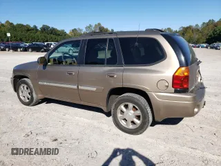 2002 GMC Envoy SLT with VIN 1GKDT13S022456264, listed as a Copart auction lot 76556004 with 230,954 mi miles and Salvage Title. Bid and sale history available at DreamBid. Image 2.